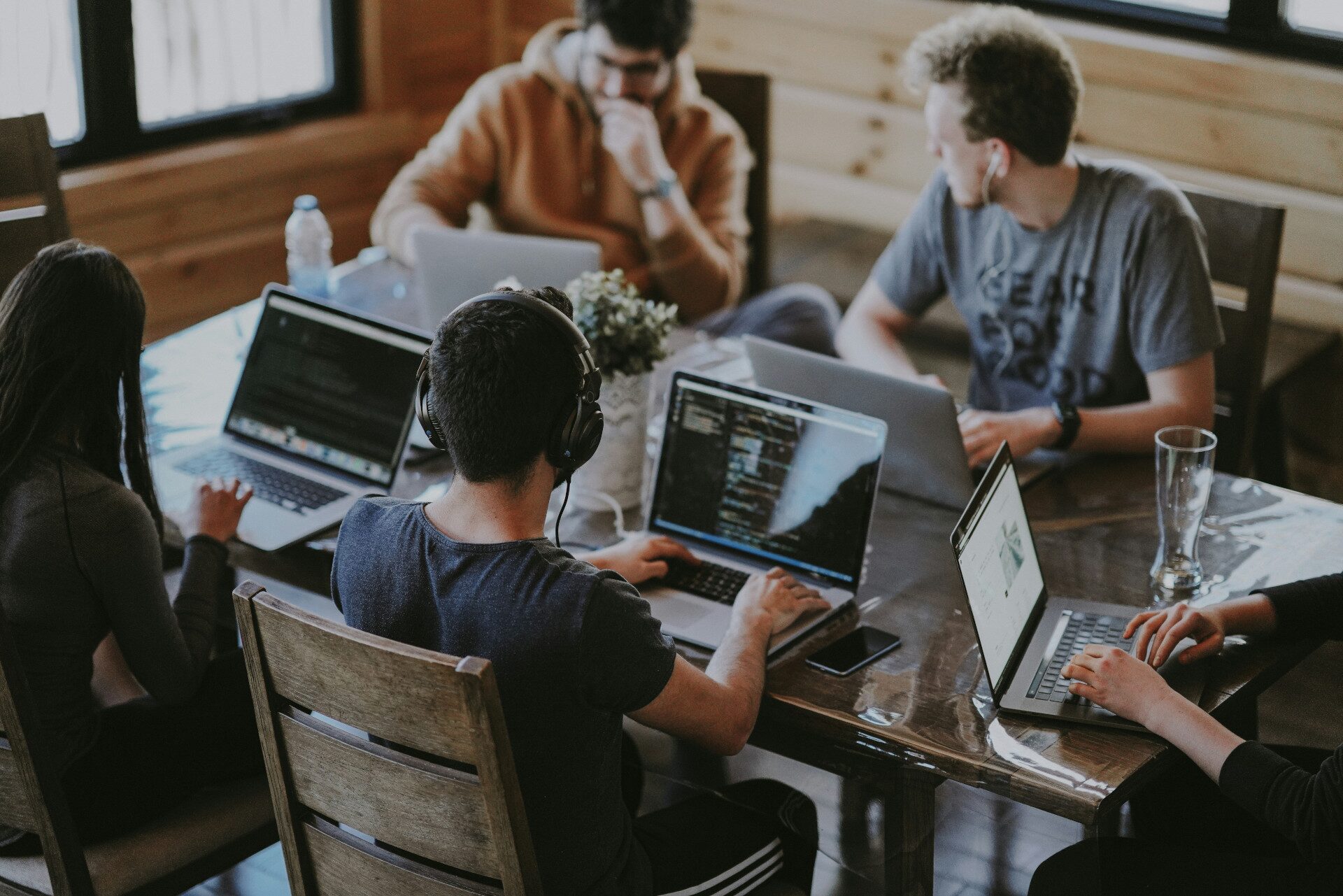 NextGen Consulting team collaborating in a workspace